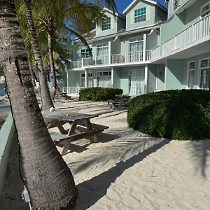 https://sunset-cove-live-on-the-beach.comcaribbean.com